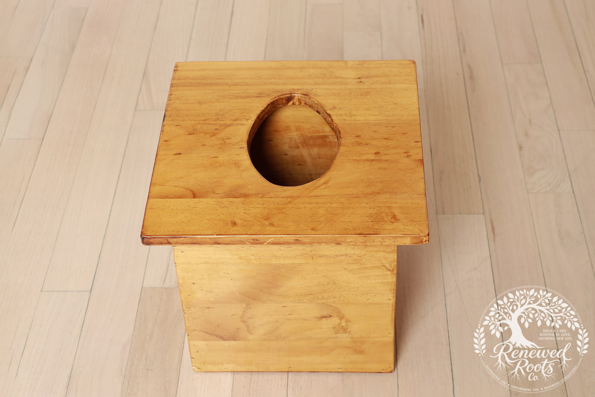 Close view of the wooden yoni steaming seat