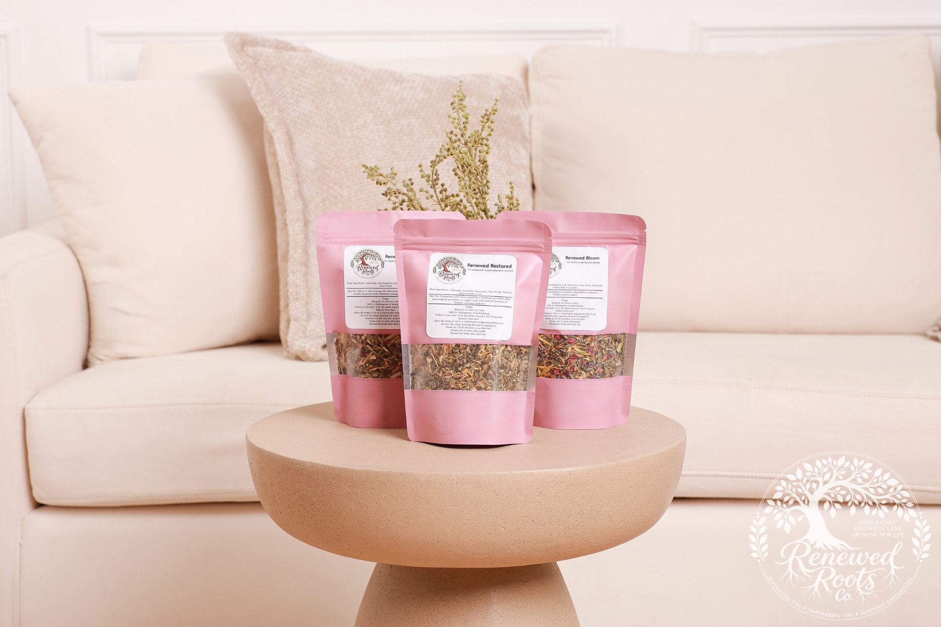 Three Renewed Roots botanical blends on a studio table